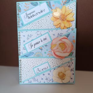 Carte Joyeux Anniversaire bleue fleurie 10,5x15cm