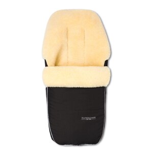 May include: A black footmuff with a cream-colored sheepskin lining. The exterior features a white piped trim and the text HOFBRUCKER EST 1988 printed in white on the lower right side. The design includes a fold-over top section and vertical seams.