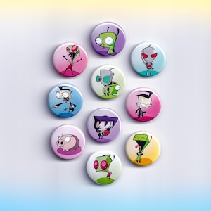 May include: A collection of eleven round, colorful buttons featuring cartoon characters. The buttons have various background colors, including pink, blue, and green. The characters are in different poses and have unique designs.