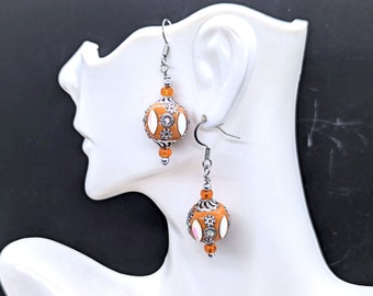 Orange Boho Bead Earrings on Stainless Steel Hooks with Embellished Clay Beads and Glass Seed Beads and Silver Tone Decorations, 2in