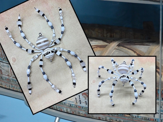A hand-beaded spider ornament that's genuinely OOAK — the kind of painstaking craft object you'd stop and stare at on someone's windowsill.