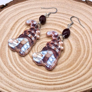 Coffee Bean Gnome Earrings on wood grain background