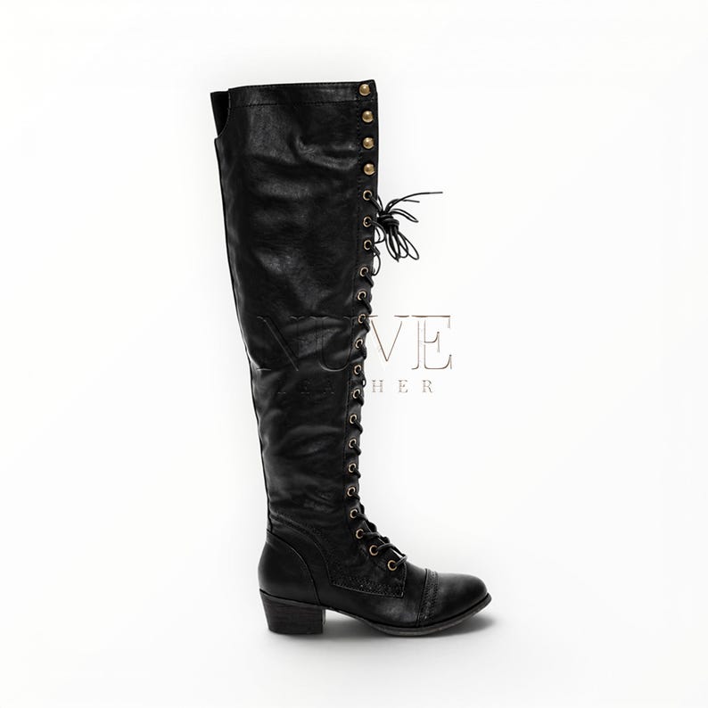 May include: Black leather knee-high boot with a lace-up design and small heel. The boot features gold-colored button details along the top and a rounded toe. The boot is shown against a white background.