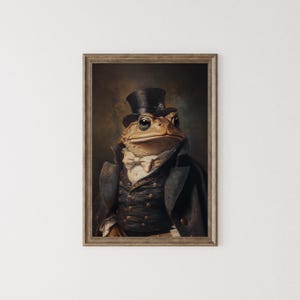 May include: A framed portrait of a frog in formal wear. The frog is depicted wearing a black top hat, a dark coat, and a white bow tie. The artwork has a vintage aesthetic with a brown and gold colour palette.