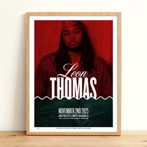 May include: A framed poster featuring Leon Thomas against a red backdrop. The poster includes the text "Leon THOMAS" in large white letters, with event details: "NOVEMBER 2ND 2025, AUSTIN CITY LIMITS SEASON 51, ACL LIVE AT THE MOODY THEATER."
