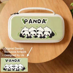 May include: A light green carrying case with a white border and handle. The case features a design of several panda bears and the word "PANDA" in green. The case is sitting on a wooden table.