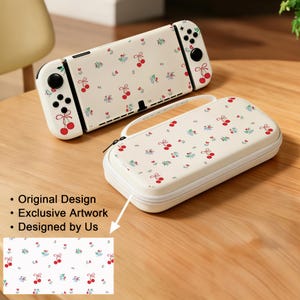 May include: Cream-colored Nintendo Switch case and console with a cherry blossom pattern. The case has a zipper closure and a handle. The console has black buttons and joysticks. The text in the image says: Original Design, Exclusive Artwork, Designed by Us.