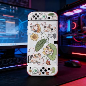 May include: White Switch console case with a playful cat-themed design. The case features red accents and is adorned with cartoon cats, sunflowers, leaves, and clouds. The buttons and joysticks have a green and white colour scheme.