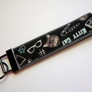 Amante de los gatos Pulsera llavero - tela sobre lienzo resistente - Llavero cordón gatito inteligente con gafas