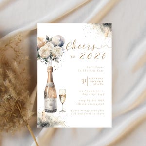 May include: New Year's invitation card with a champagne bottle, a glass of champagne, and floral and balloon accents. The text reads "Cheers to 2026" and includes event details. The design features watercolor effects.