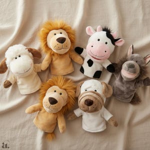 May include: A collection of plush hand puppets in the shapes of various animals, including a lion, sheep, cow, dog, and wolf. The puppets are made of soft, textured materials in shades of brown, white, and gray, with detailed facial features.