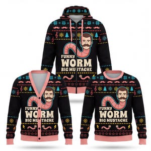 Op de afbeelding: Een zwarte hoodie met rits, een vest met knopen en een trui met ronde hals, elk voorzien van een roze worm met een menselijk hoofd en snor, de tekst "FUNNY WORM BIG MUSTACHE" en een kleurrijk vakantiepatroon met sneeuwvlokken en bomen.
