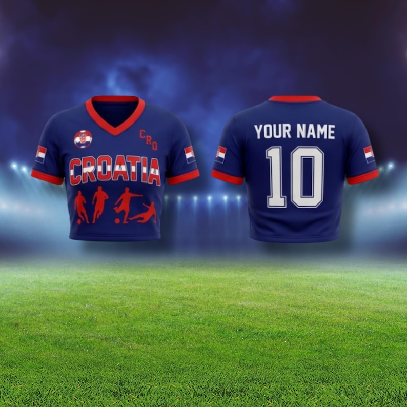 May include: A navy blue Croatia soccer jersey with red trim and the word "CROATIA" in white. The front features soccer player silhouettes. The back displays "YOUR NAME" above the number "10" in white.