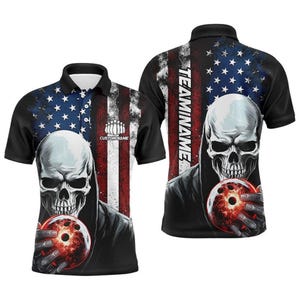 May include: Black polo shirt featuring a skull graphic holding a bowling ball. The shirt has an American flag design on the front and back, with the text "TEAMNAME" and "CUSTOM NAME" visible. The shirt is designed for bowling.