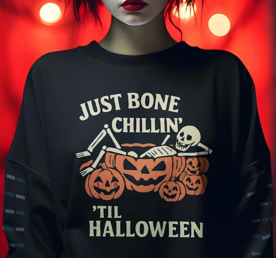 Ghostly Reading Skeleton Sweatshirt: Halloween Book Lover Crewneck