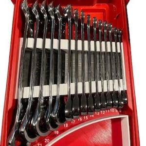 May include: A set of chrome wrenches neatly arranged in a red plastic case. The wrenches are of varying sizes, with the sizes printed on the case. The case has a clear lid and a white insert to hold the wrenches in place.