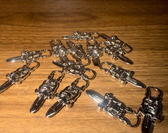 Silver dagger zipper piece for DIY crafts, sweaters, & bags