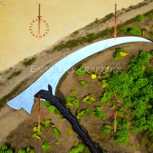 May include: A fantasy-themed image featuring a large scythe with a black handle and a silver blade. The image also includes several decorative swords and the text "ENABLERS CRAFTER'S". The scene is set in a miniature landscape with greenery.