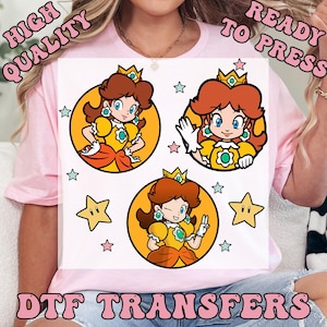 May include: DTF transfers featuring three images of a cartoon princess in a yellow dress, each within a yellow circle. The princess has brown hair, a crown, and blue eyes. The words "HIGH QUALITY" and "READY TO PRESS" are at the top. The words "DTF TRANSFERS" are at the bottom.