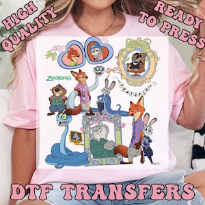 May include: A DTF transfer featuring various characters from the animated film "Zootopia." The design includes images of Nick Wilde, Judy Hopps, and other characters in a colorful, cartoon style. The words "HIGH QUALITY" and "READY TO PRESS" are also visible.