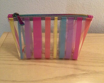 Clear Vinyl Pouch with Rainbow stripes.