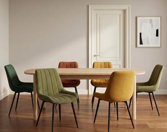 Chenille collection designer dining chairs in terracotta, olive green, mustard yellow and forest green with black metal legs