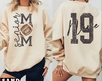 Football Senior Mom 2027 Sweatshirt and Hoodie, Customizable Football Mom Graphic, Personalized Name Tee, Senior Year Football Gift Idea