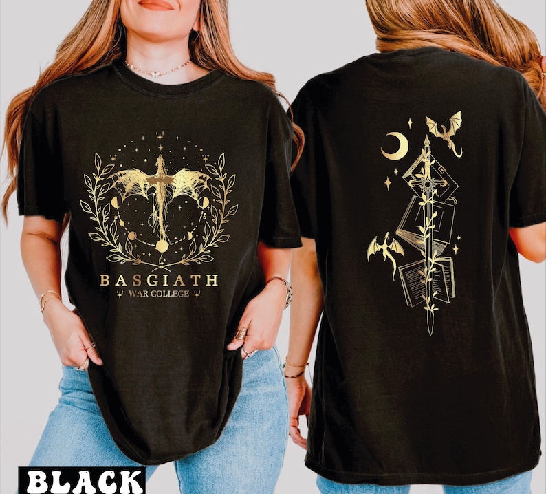 A woman wearing a black t-shirt with a gold design on the front and back.