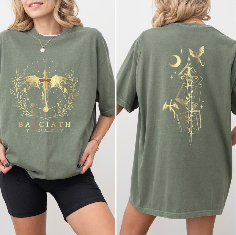 a woman wearing a green t-shirt with a gold design on the front and back.