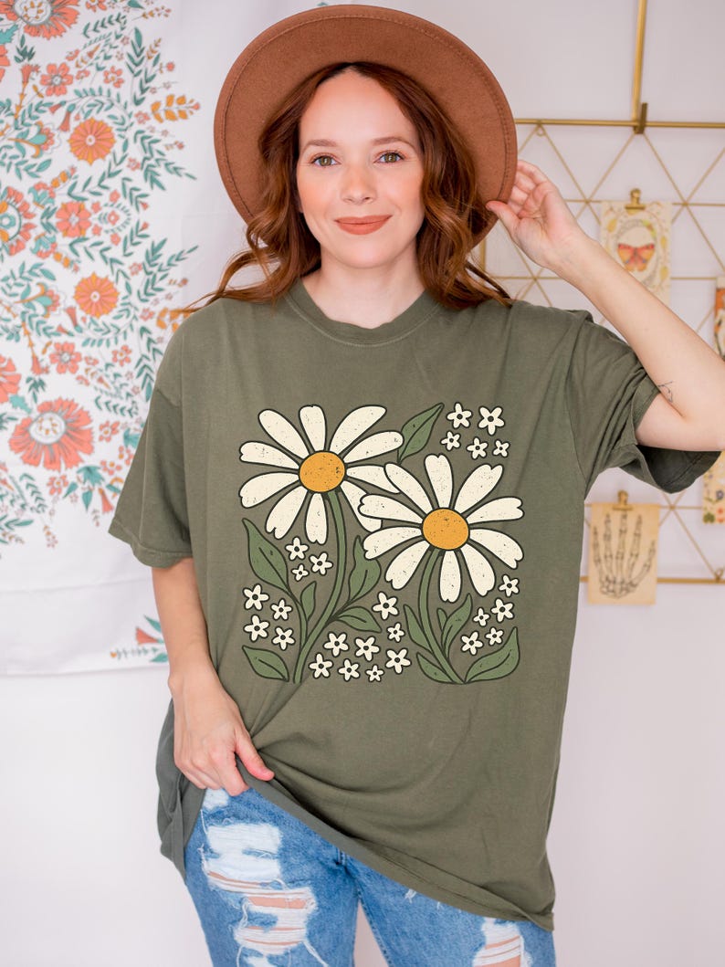 a woman wearing a brown hat and a green shirt