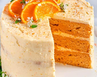 Sinaasappelcake met een frisse roomkaasglazuur.