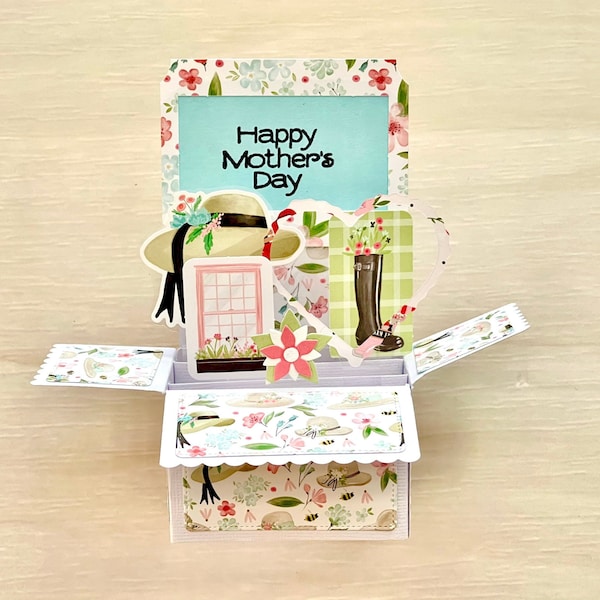 Carte pop-up 3D pour la fête des mères, thème jardinage, joyeuse fête des mères, râteau pour chapeaux et bottes, floral rose vert,