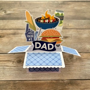Biglietto pop-up per la festa del papà in scatola 3D | Tema barbecue | Grigliata di mais con hamburger | Numero 1 papà | Si piega in piano per la spedizione | Spedizione gratuita negli Stati Uniti