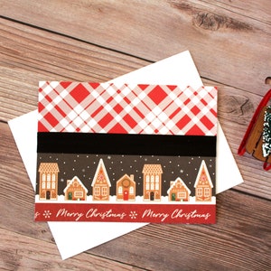 Carte de Noël l Joyeux Noël l Maisons en pain d'épice l Plaid l Ruban noir l Village enneigé l Intérieur vierge l Livraison gratuite aux États-Unis