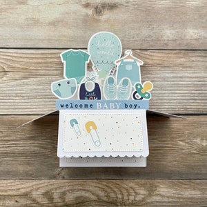 Carte pop-up 3D pour bébé garçon l Bienvenue à tout le monde l Vêtements pour bébé l Turquoise et blanc l Livraison gratuite aux États-Unis