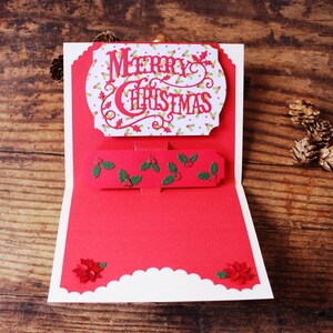 Tarjeta navideña emergente l Feliz Navidad l Blanco roto y rojo l Holly Pointsettia l Única en su tipo l Interior en blanco