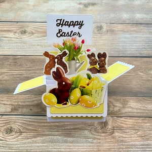 Biglietto di Pasqua pop-up 3D con scatola l Tema coniglietto di cioccolato l Fiori l Giallo e marrone l Si piega in piano per la spedizione l Spedizione gratuita negli Stati Uniti