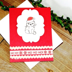 Carte de Noël l Chat portant un bonnet de Noel l Ho Ho Hol l Flocons de neige l Ruban l Rouge blanc l Intérieur vierge l Livraison gratuite aux États-Unis