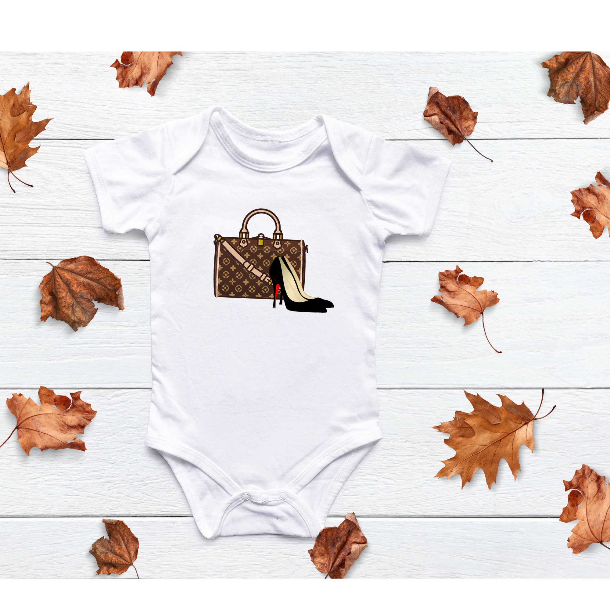 Fashion firm Louis Vuitton is flogging baby-grow for newborns for a  whopping £900