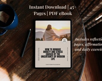 May include: A digital eBook on a tablet, titled "How to Manage Anxiety and Stress Caused by the Uncertainty of Modern Life." The image on the tablet shows a person overlooking a mountain range at sunset. Includes reflection pages, affirmations, and daily exercises.