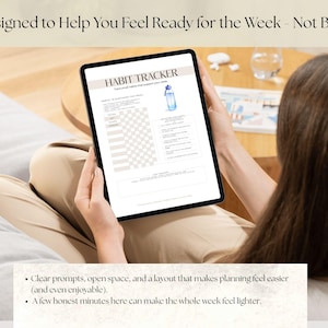 May include: A digital tablet displaying a habit tracker with a light beige background. The text "HABIT TRACKER" is at the top. The image includes a watercolor illustration of a water bottle. The text "Designed to Help You Feel Ready for the Week - Not Busy" is at the top.
