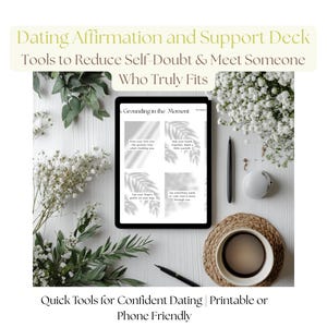 May include: A digital tablet displays a self-help guide titled "Grounding in the Moment." The image is surrounded by white flowers, greenery, a pen, a small white object, and a woven coaster with a cup. Text at the top reads "Dating Affirmation and Support Deck."