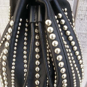 black purse with studs
