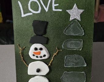 Sneeuwpop en kerstboom. Trommelglas 'Liefde'