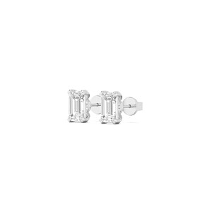 May include: A pair of silver stud earrings featuring rectangular, clear gemstones. The earrings are set in a simple, minimalist design, with a post and backing for secure wear. The gemstones have a brilliant cut, reflecting light.
