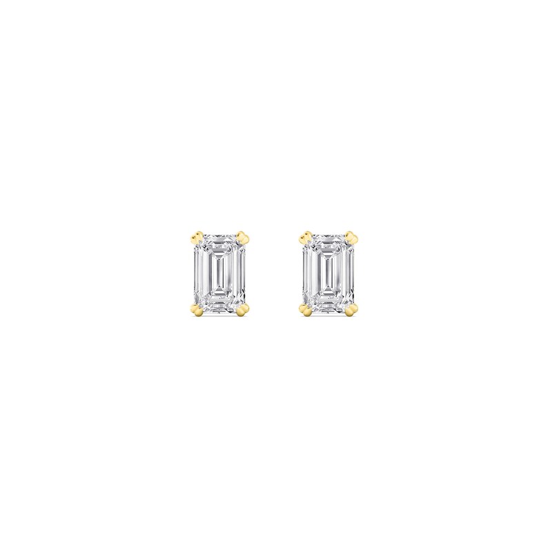 May include: A pair of emerald-cut diamond stud earrings. The clear, rectangular-shaped diamonds are set in a four-prong, yellow gold setting. The earrings are displayed against a white background.