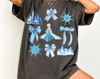 Elsa Frozen Shirt, Watercolor Ice Castle Tee, Coquette Blue Bow Top, Magical Winter Vacation Gift, Vintage Princess Graphic Shirt, Elsa Tee
