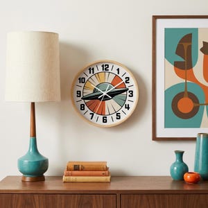 Orologio da parete in stile Mid-Century Modern, orologio a raggiera, decorazione murale atomica color verde acqua e arancione.