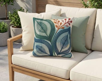 Cojín lumbar abstracto con diseño de hojas para exteriores, cojín botánico para patio, decoración de porche en azul verdoso, aspecto estampado y bordado.