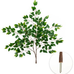 May include: Artificial green leafy tree branch with a brown stem and multiple smaller branches. The leaves are a vibrant green color. A close-up shows the base of the branch with a brown textured covering and metal supports.